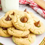 Peanut Butter Chocolate Kisses Cookies on stacked white plate