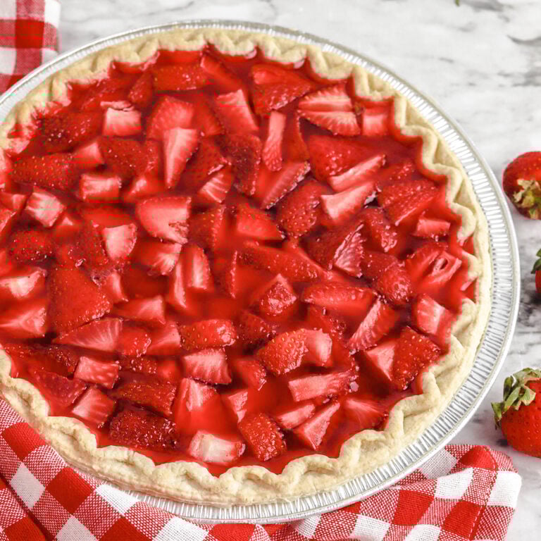 Whole Uncut Shoneys Strawberry Pie on counter