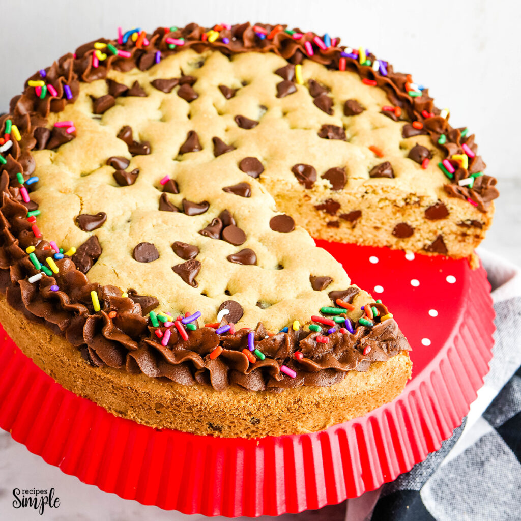 Chocolate Chip Cookie Cake on red serving stand