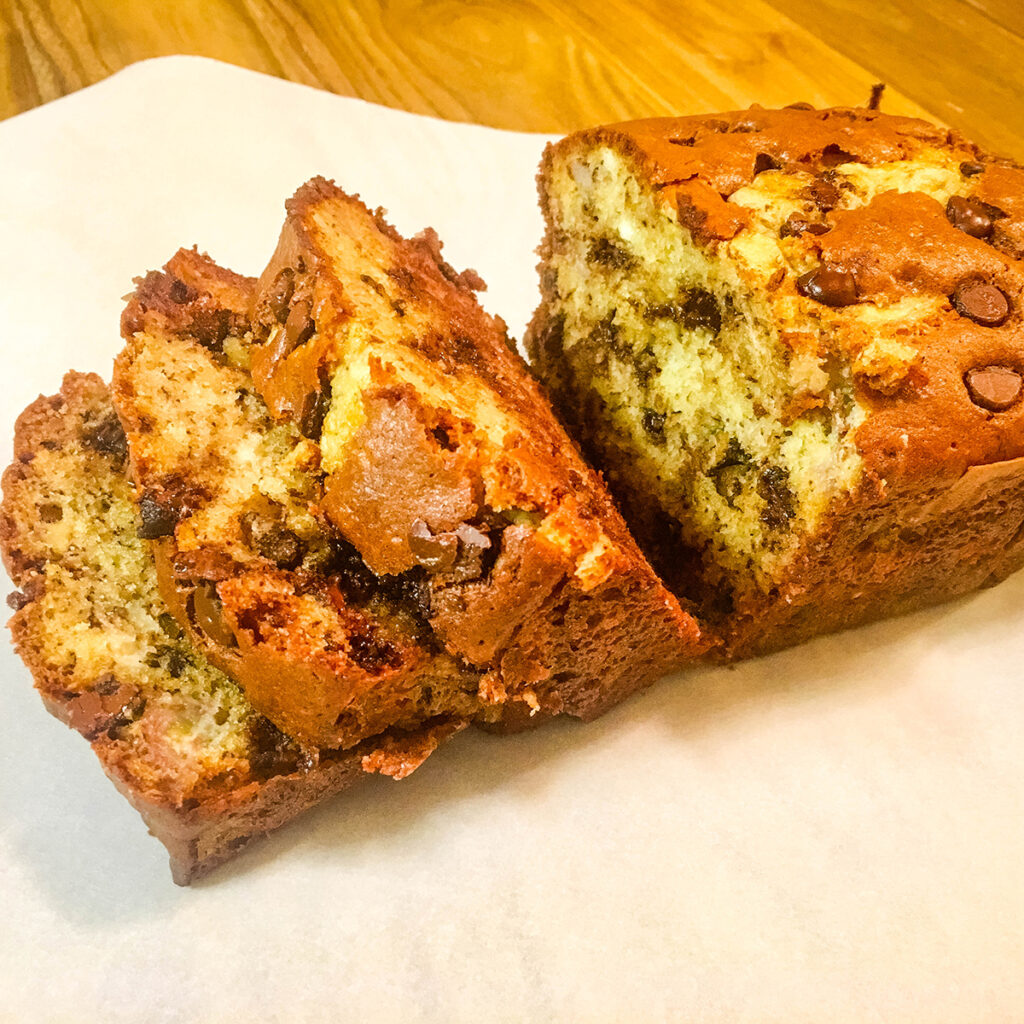 Chocolate Chip Banana Bread sliced on parchment paper