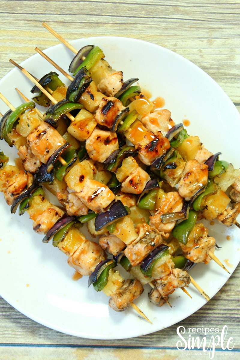 Chicken Skewers on white serving platter.