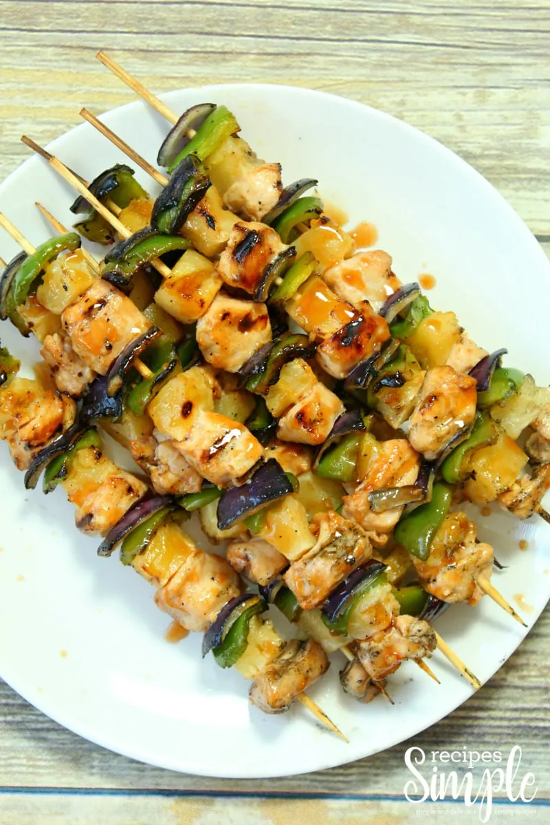 Chicken Skewers on white serving platter.
