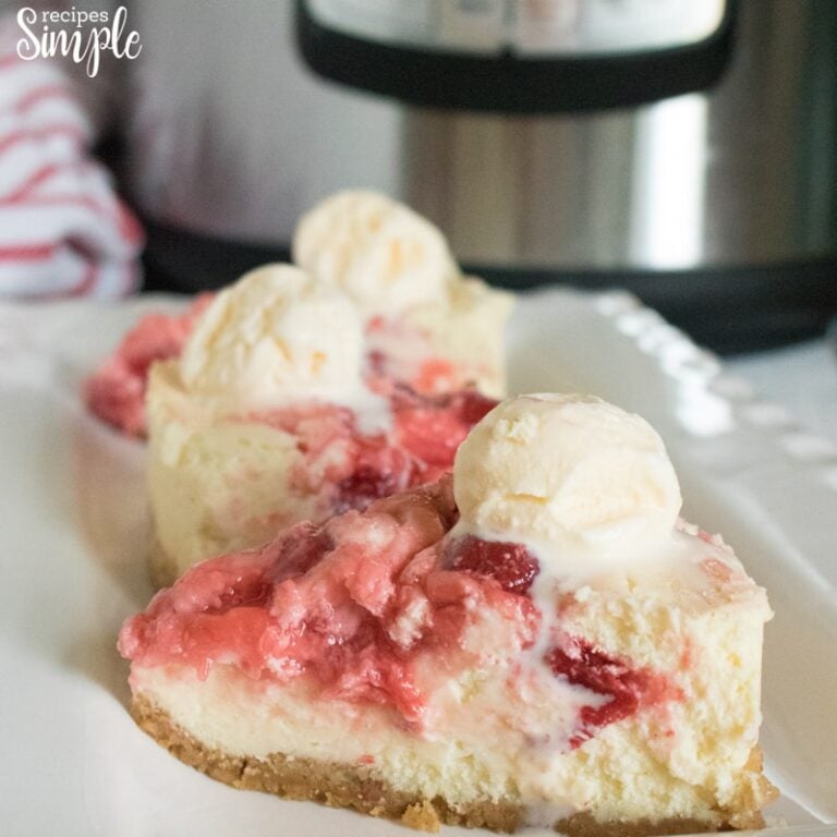 Slices of Cherry Cheesecake on white serving platter.