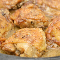Keto Garlic Roasted Chicken Thighs Parmesan Gravy In Skillet