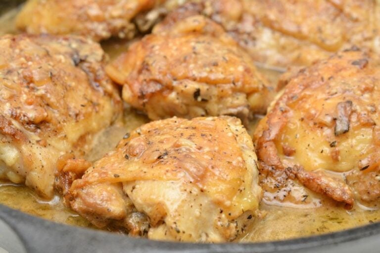 Keto Garlic Roasted Chicken Thighs Parmesan Gravy In Skillet