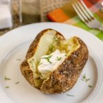 Air Fryer Baked Potatoes on plate