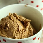 Chocolate Ice Cream in white cup with red dots