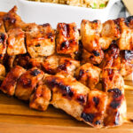 Grilled Pork Kabobs on wooden serving tray