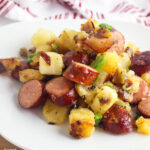 Cajun Sausage and Potatoes on white plate