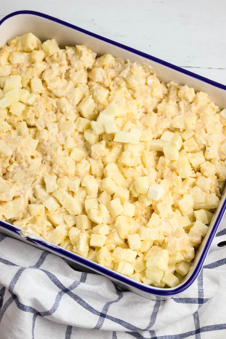 Potatoes added to casserole dish