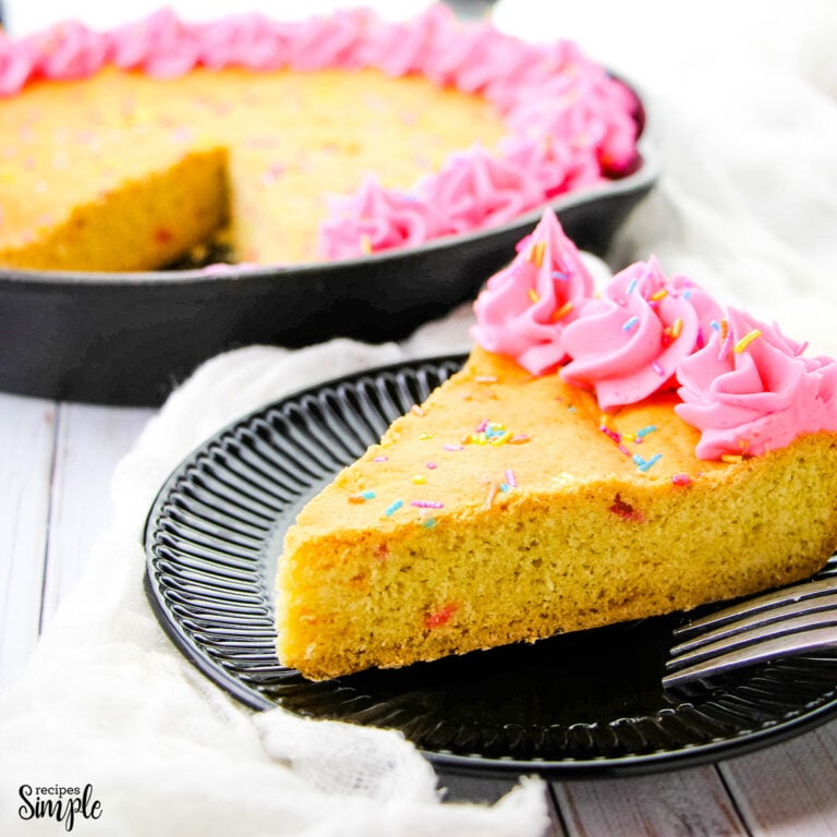 Slice of Skillet Sugar Cookie on black plate