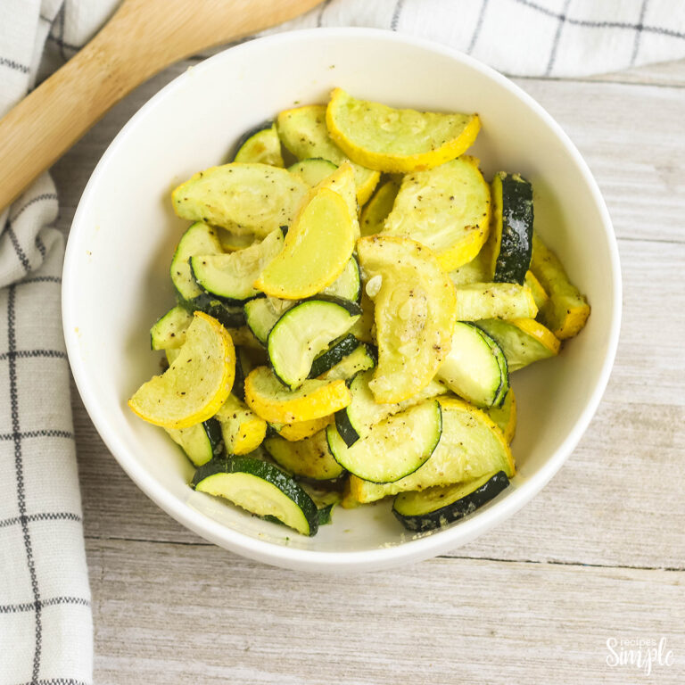 Roasted Zucchini And Squash served in white bowl