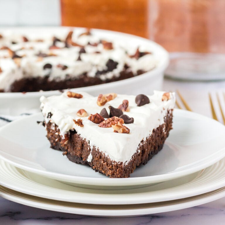 A slice of Mississippi Mud Pie on a white plate.