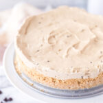 Tiramisu Cheesecake on white serving platter.