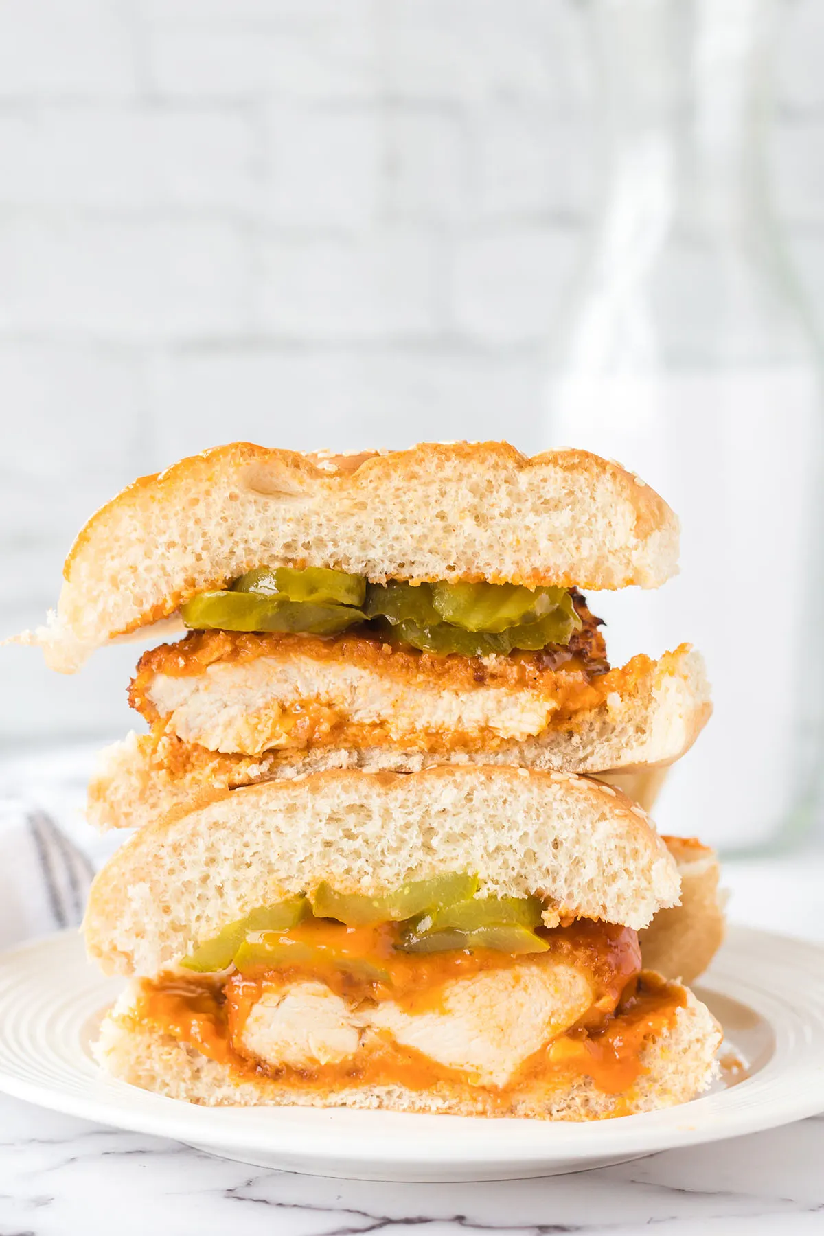 Buffalo Chicken Sandwich cut in half and stacked on top of each other.