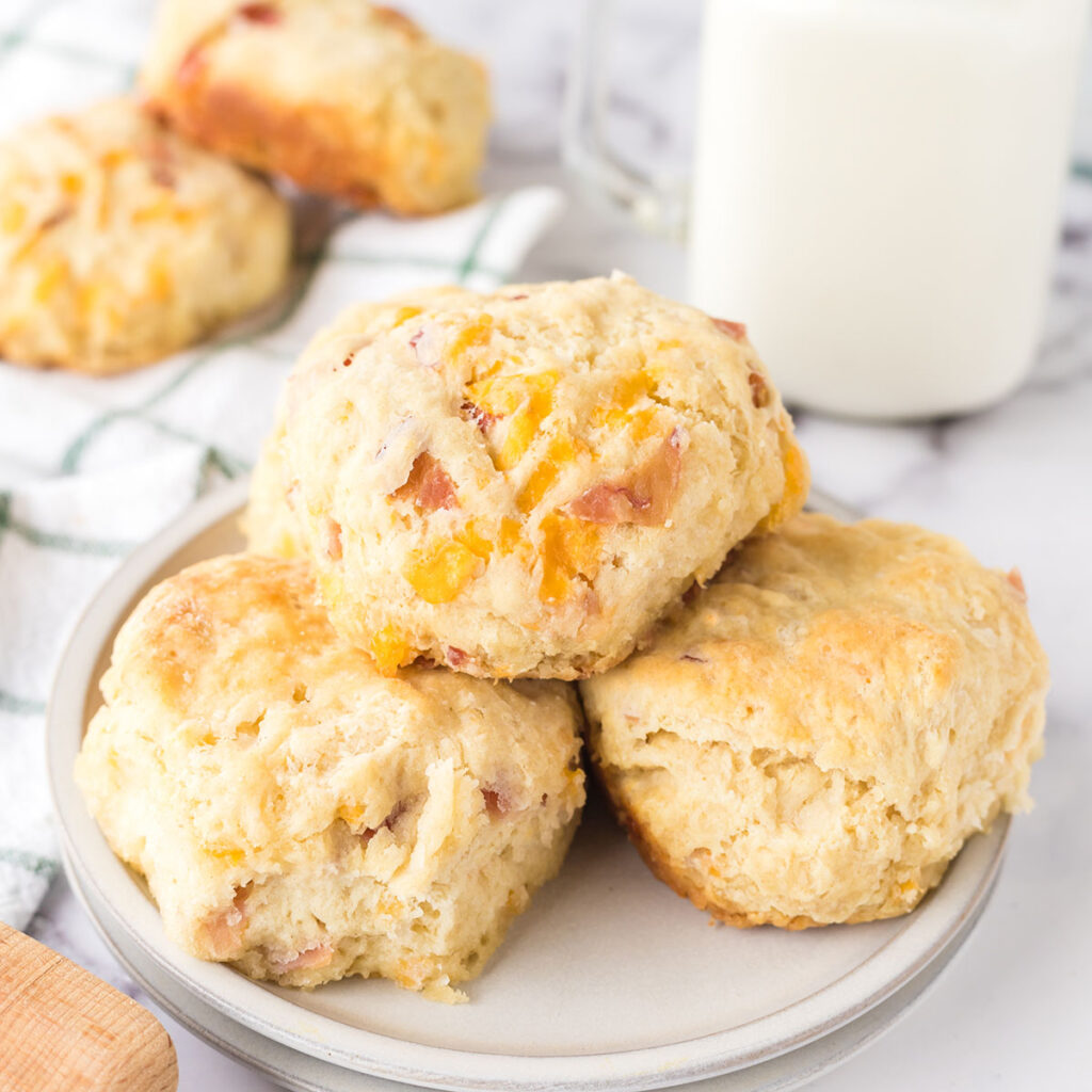 Three Bacon Cheddar Biscuits on plate.
