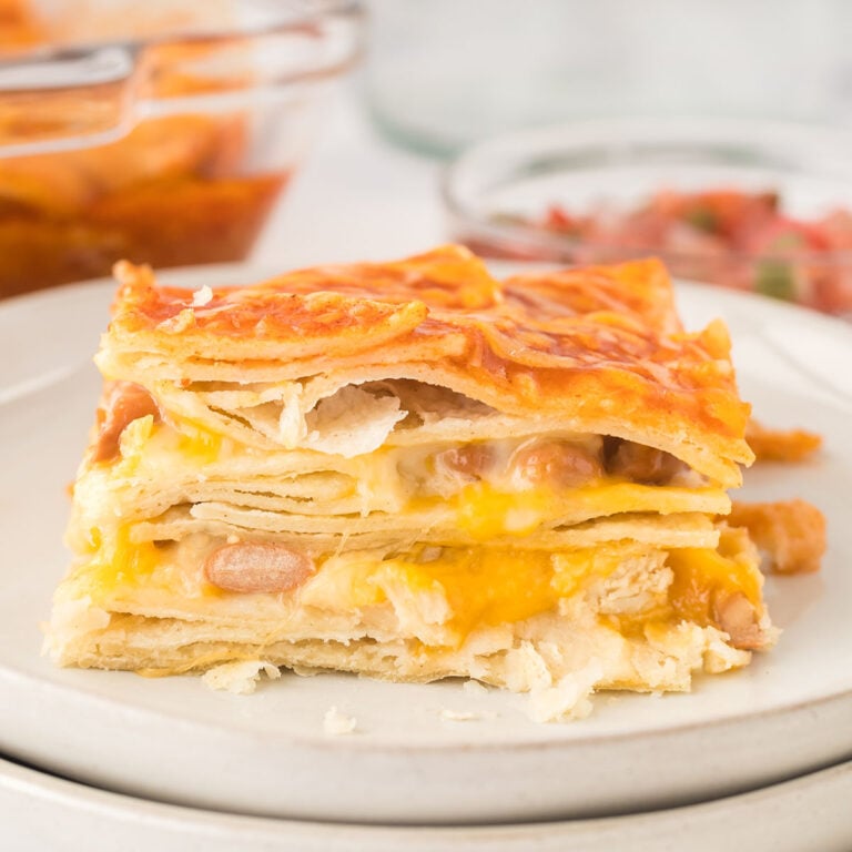 Slice of Chicken Enchilada Casserole on plate.