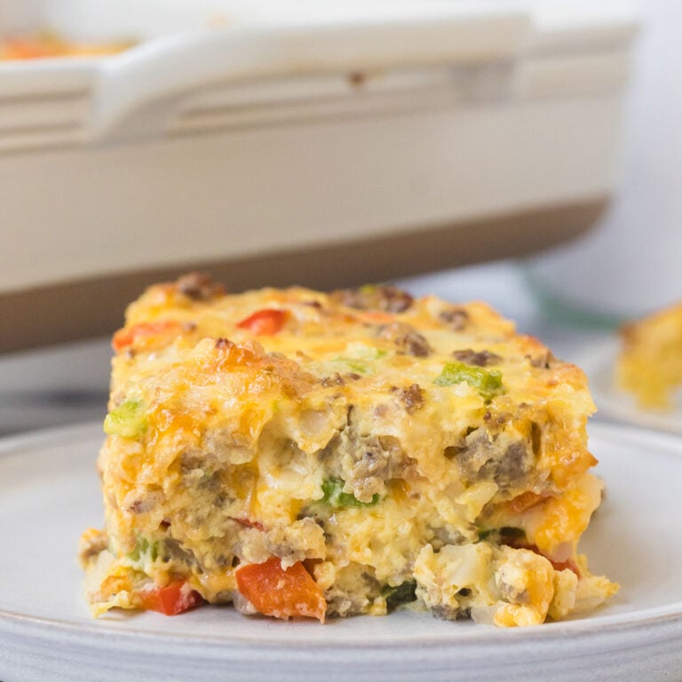 Slice of breakfast casserole on plate.