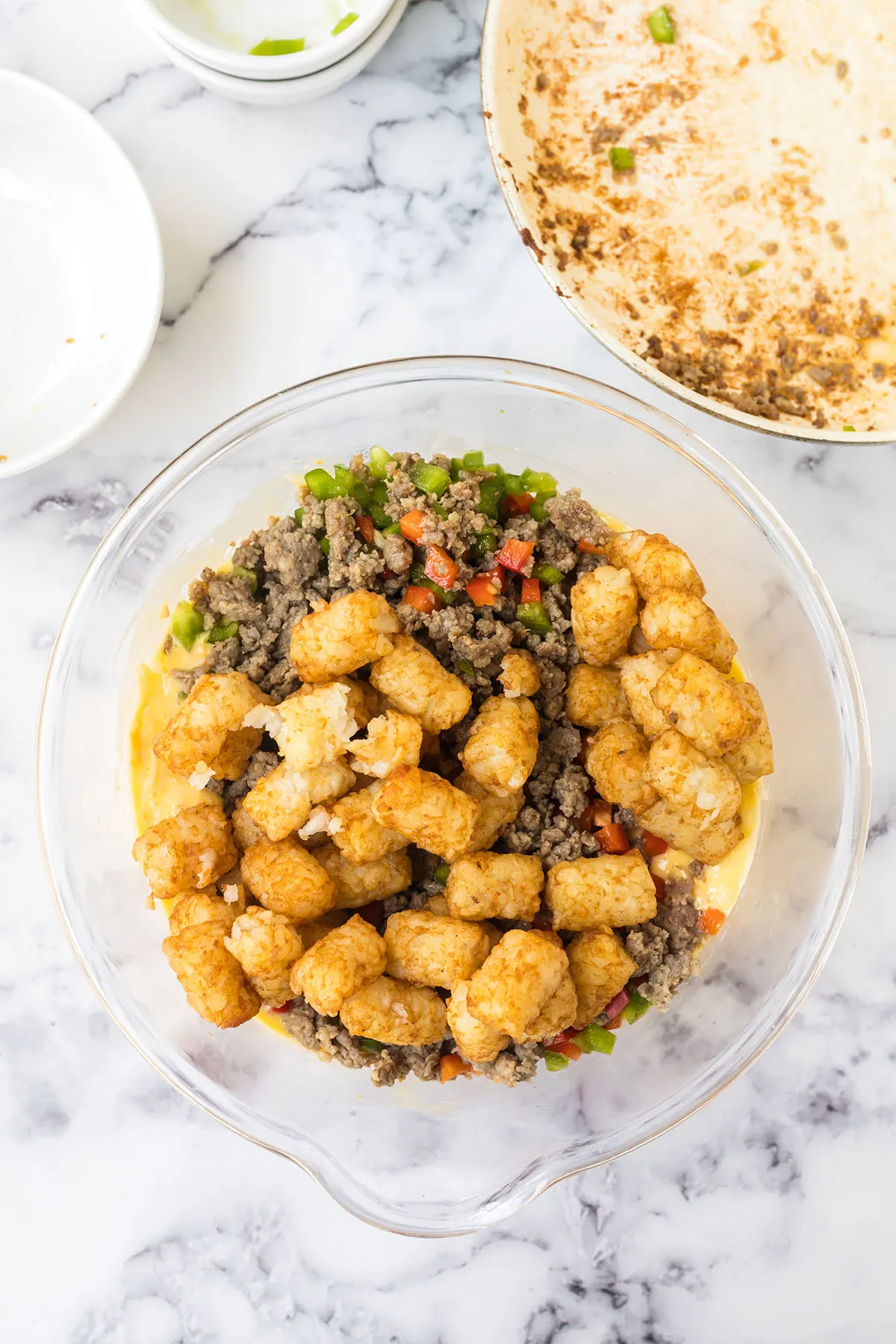 Tater Tots added to all other ingredients in mixing bowl