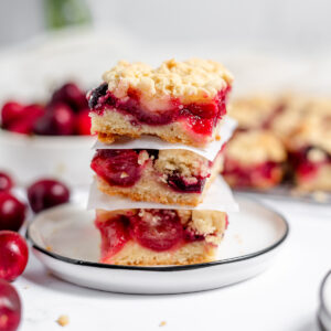 Three Cherry Bars stacked together on plate.