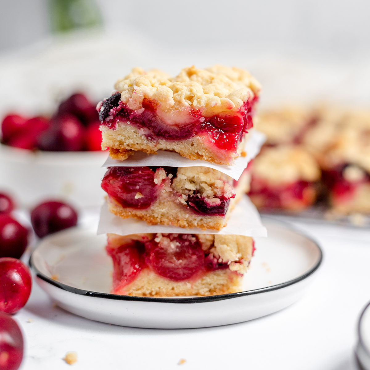 Three Cherry Bars stacked together on plate.
