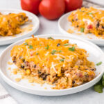 Serving of Chicken Tortilla Casserole on white plate.