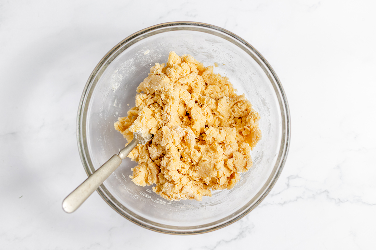 Crust dough in glass mixing bowl.
