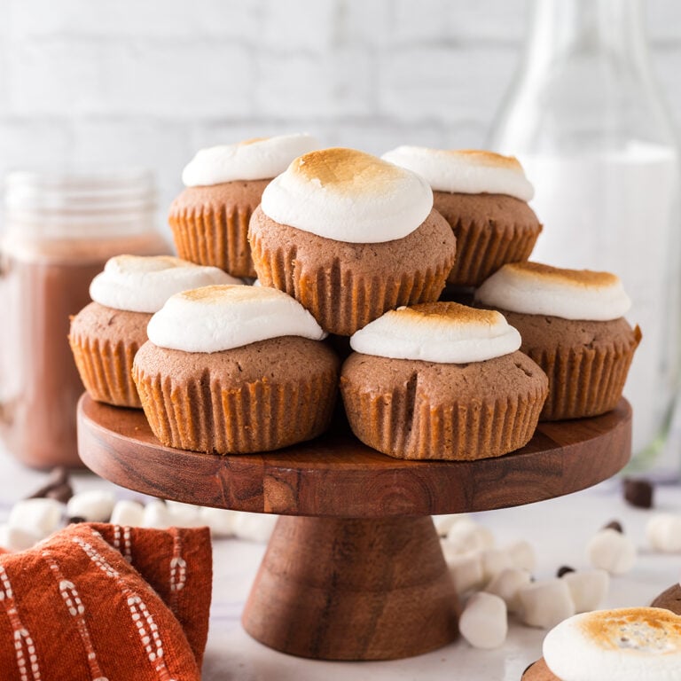 Hot Chocolate Cupcakes served on wooden stand.