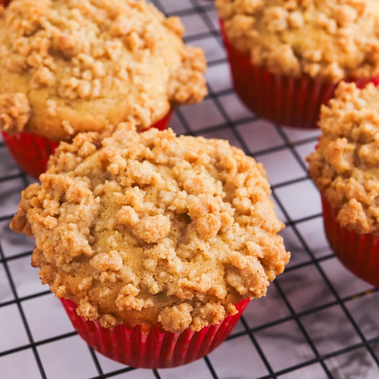 Cranberry Sauce Muffins on wire cooling rack.