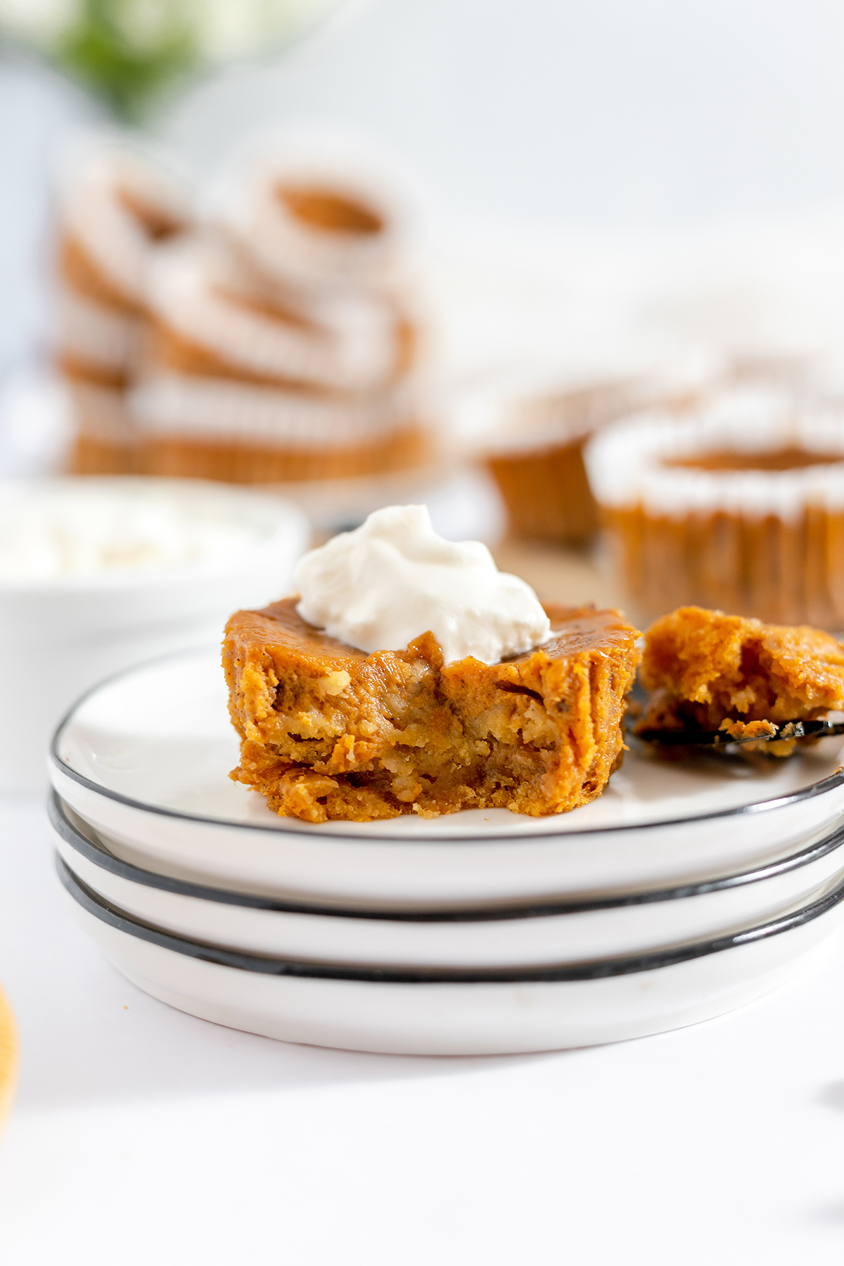 Mini Pumpkin Pie on small white plate.