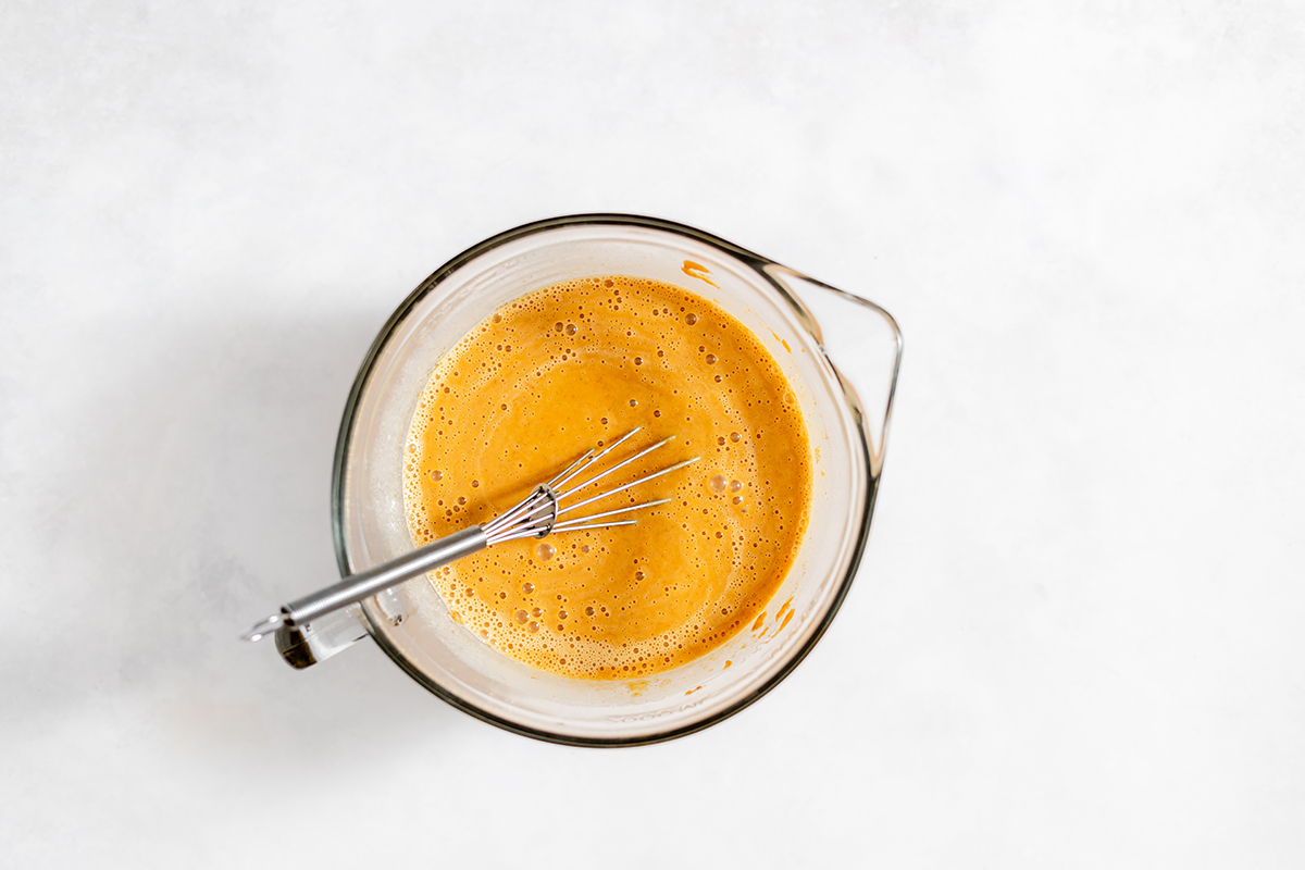 Mini pumpkin pie batter in mixing bowl.