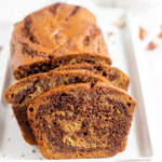 Nutella Banana Bread on a white serving platter.