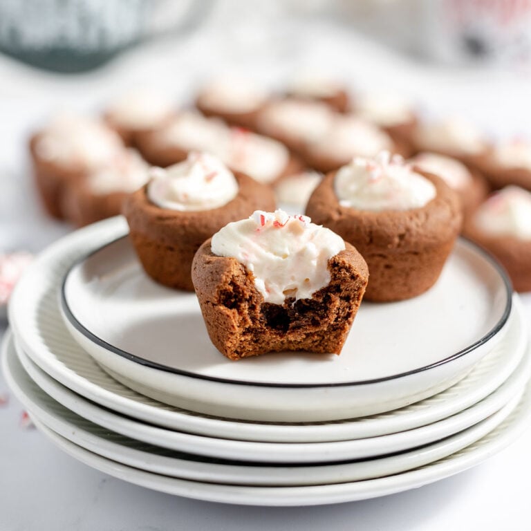 Peppermint Cheesecake Cookie Cups on white plate.