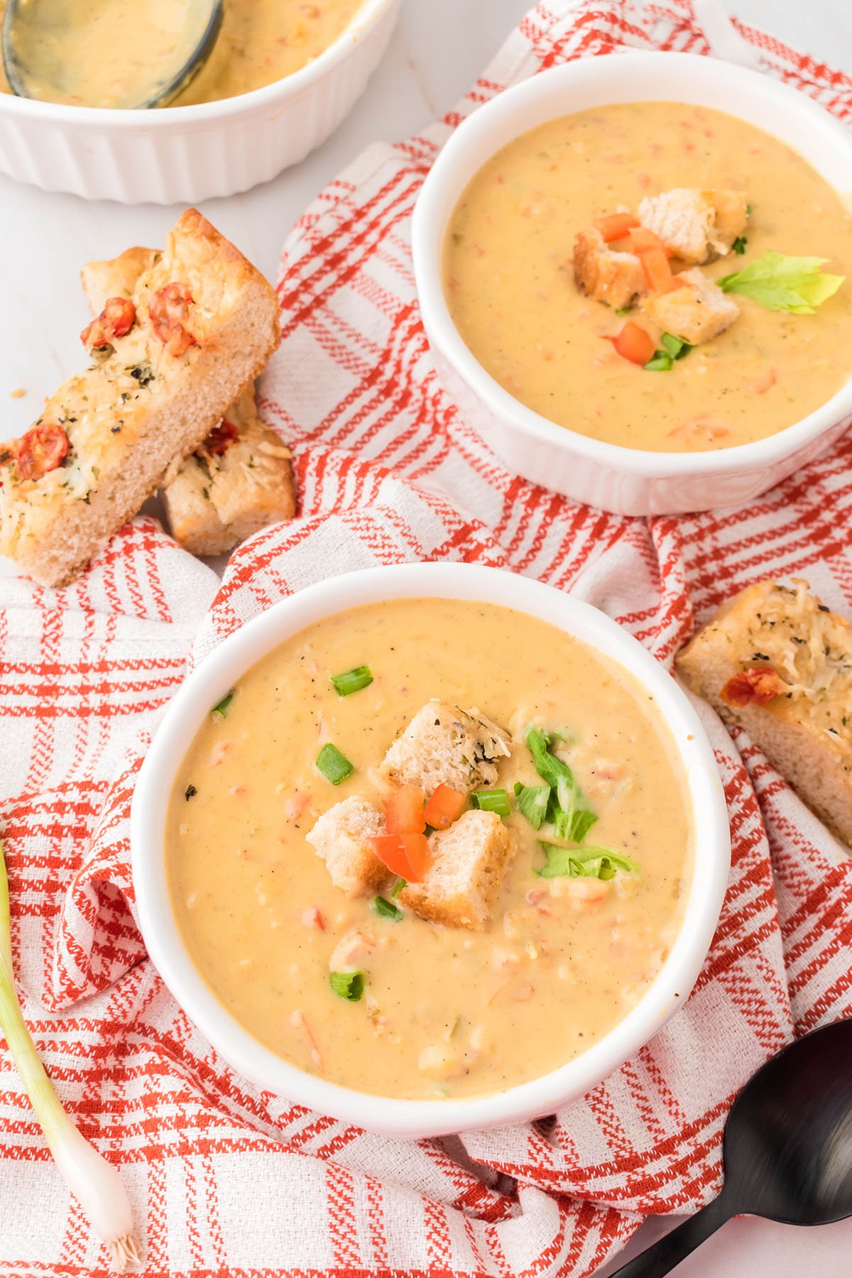 Two bowls of Cheese Soup.