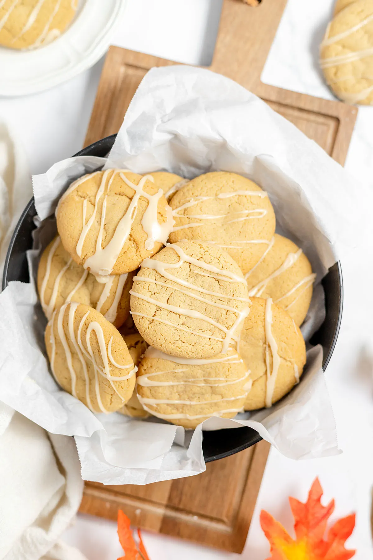 Maple Brown Sugar Cookies served on a platter on a wooden serving board.