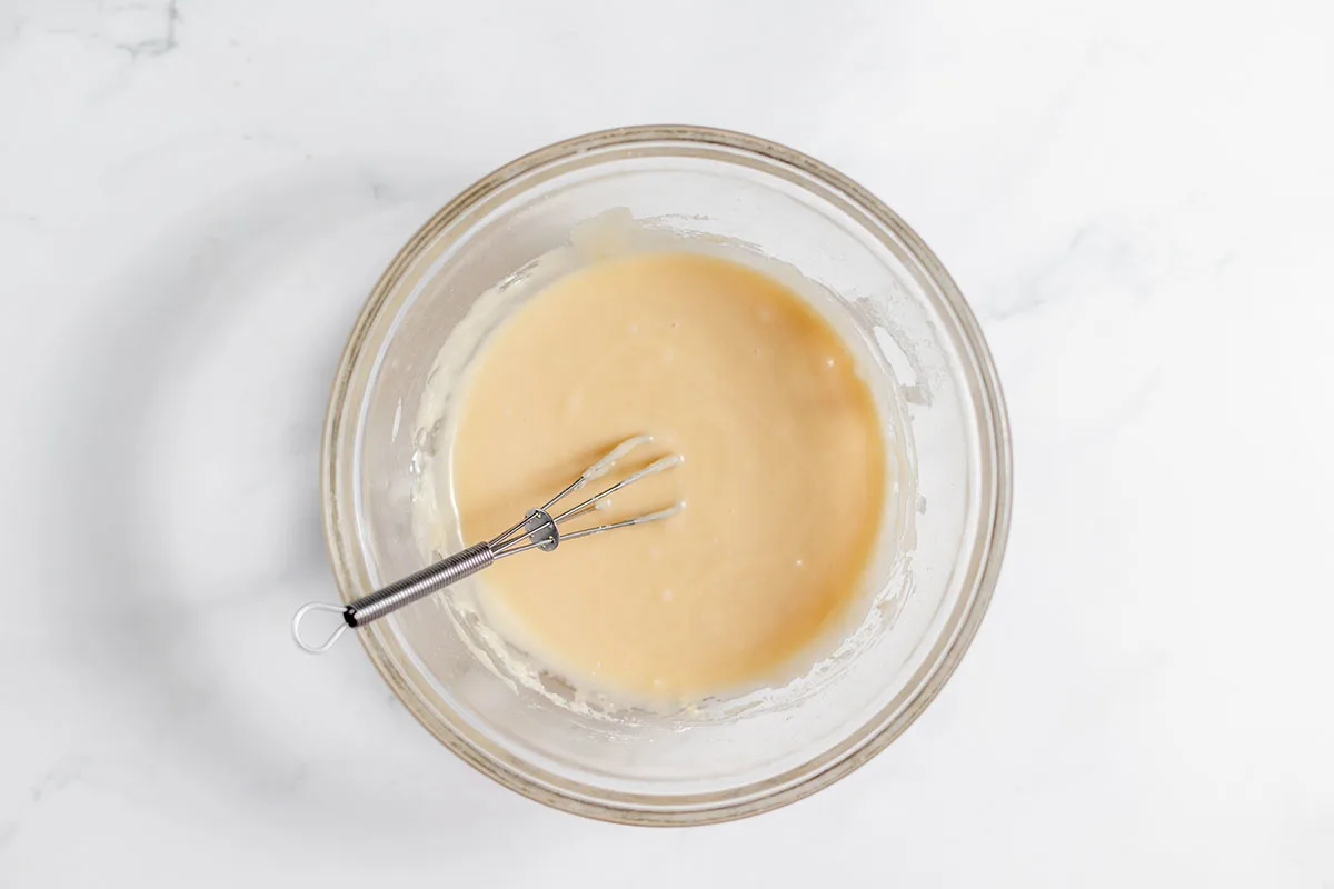 Maple Icing for cookies in a bowl.