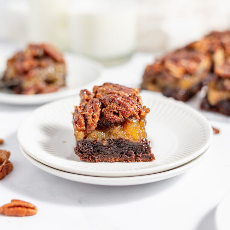 Pecan Pie Brownie on a white plate.