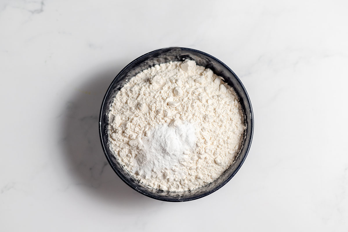 Flour, baking soda, and salt in a bowl.