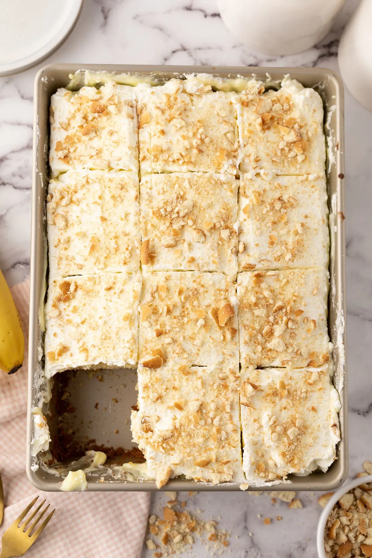 Baked Banana Pudding Poke Cake in baking pan.