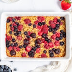 Berry Baked Oatmeal in a white baking dish.