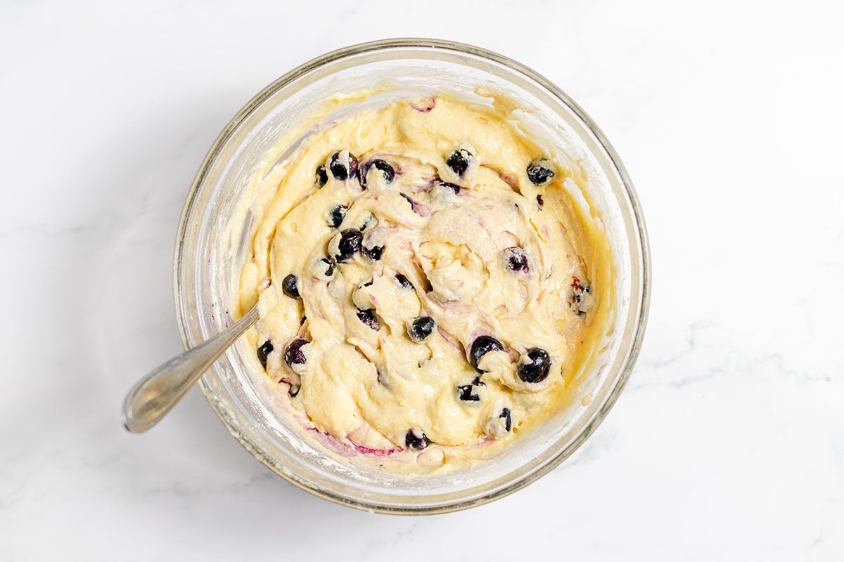 Blueberry lemon muffin batter in the mixing bowl.