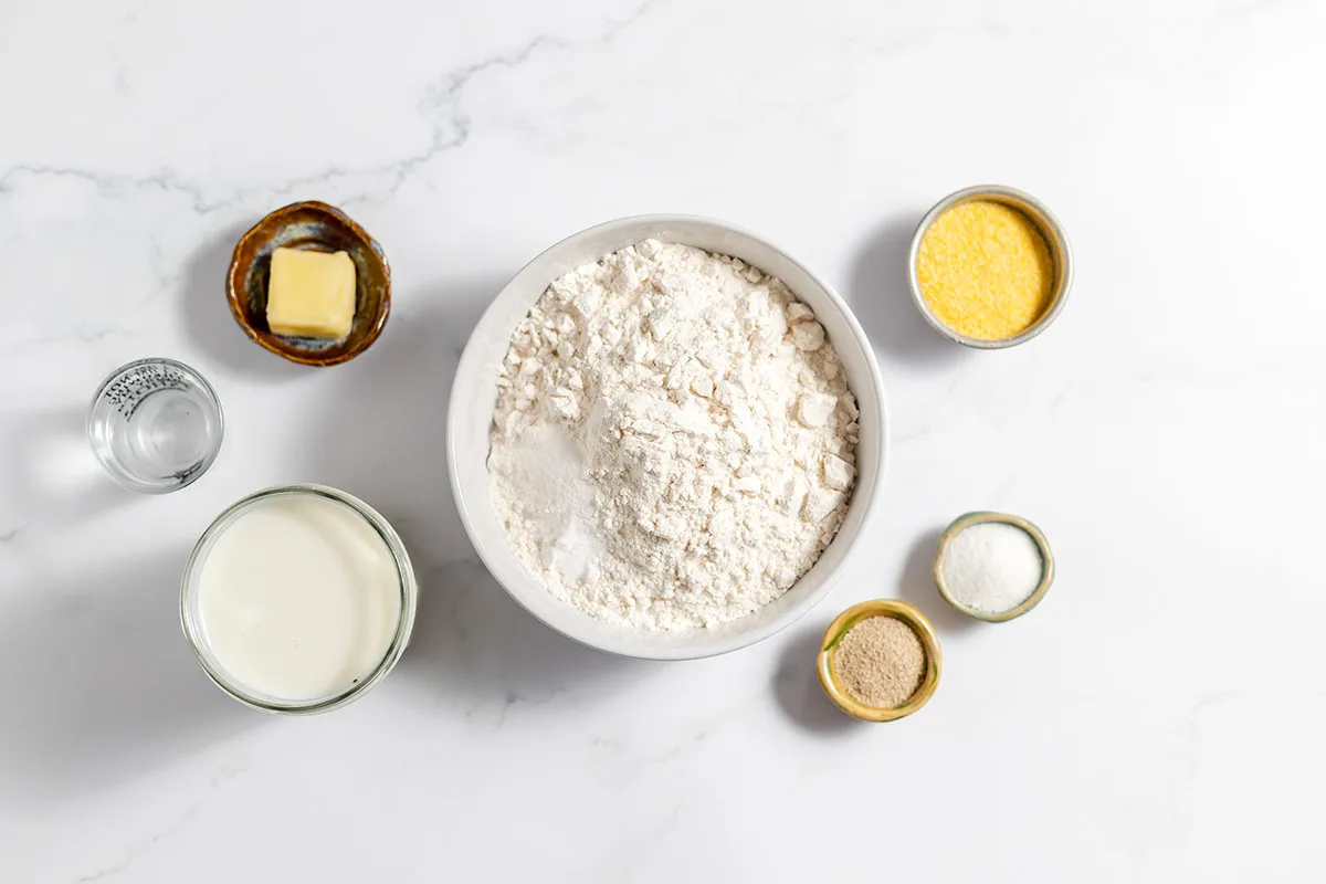 Ingredients to make English Muffin Bread set out on the counter.