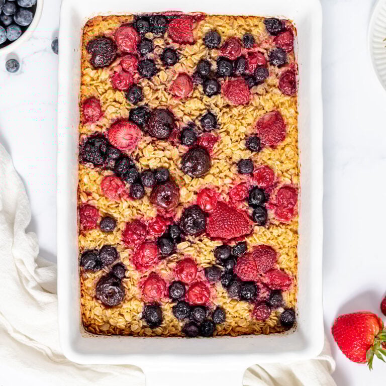 Berry Baked Oatmeal in a white baking dish.