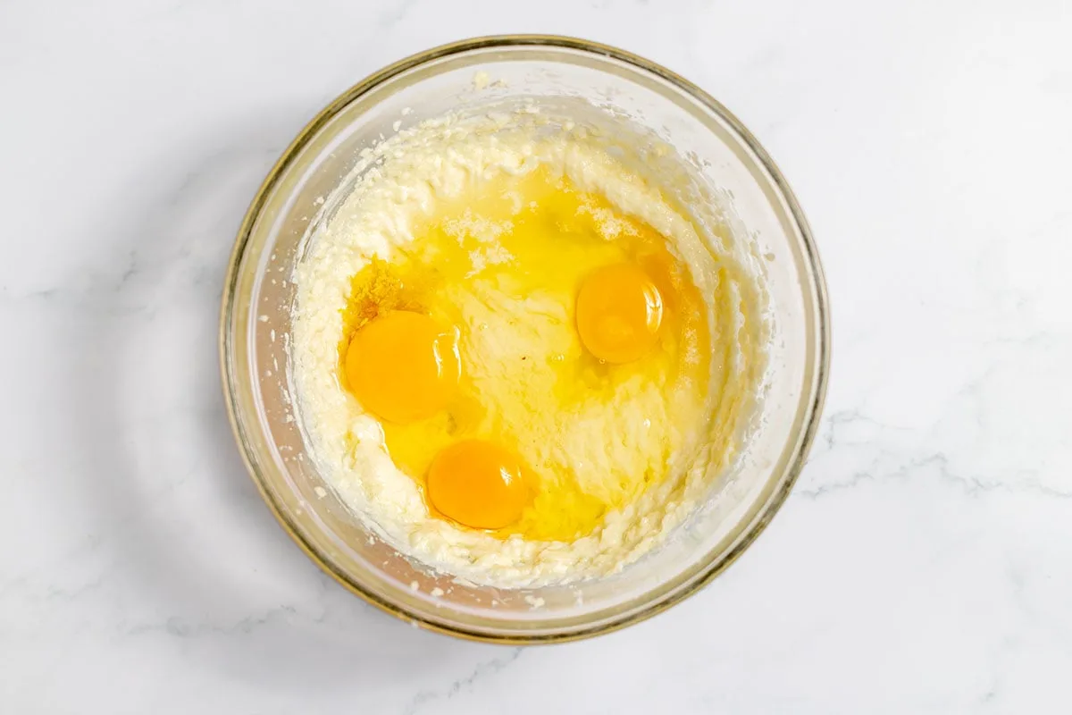Eggs and milk added to the mixing bowl