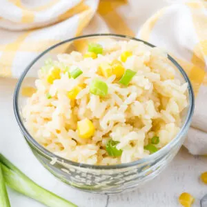 Corn Rice served in a glass bowl.
