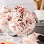 Dark Chocolate Raspberry Ice Cream served in a glass dessert bowl.
