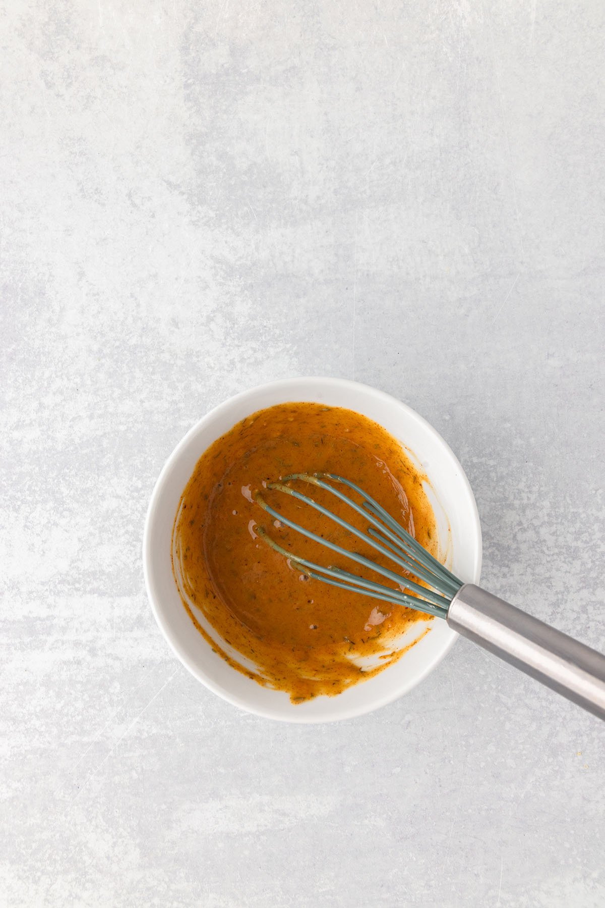 Honey Mustard marinade in a small bowl.