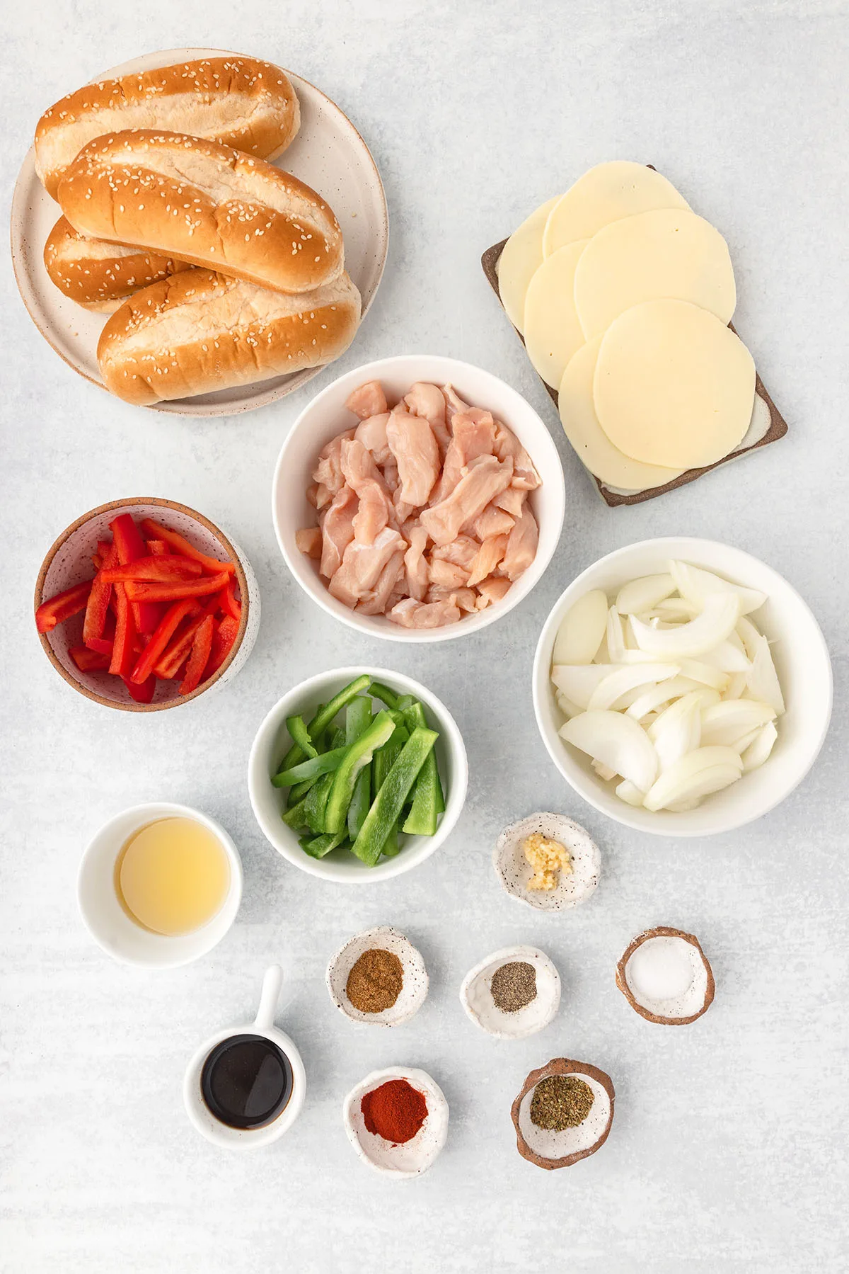 Ingredients to make Chicken Philly Sandwiches set out on the counter.