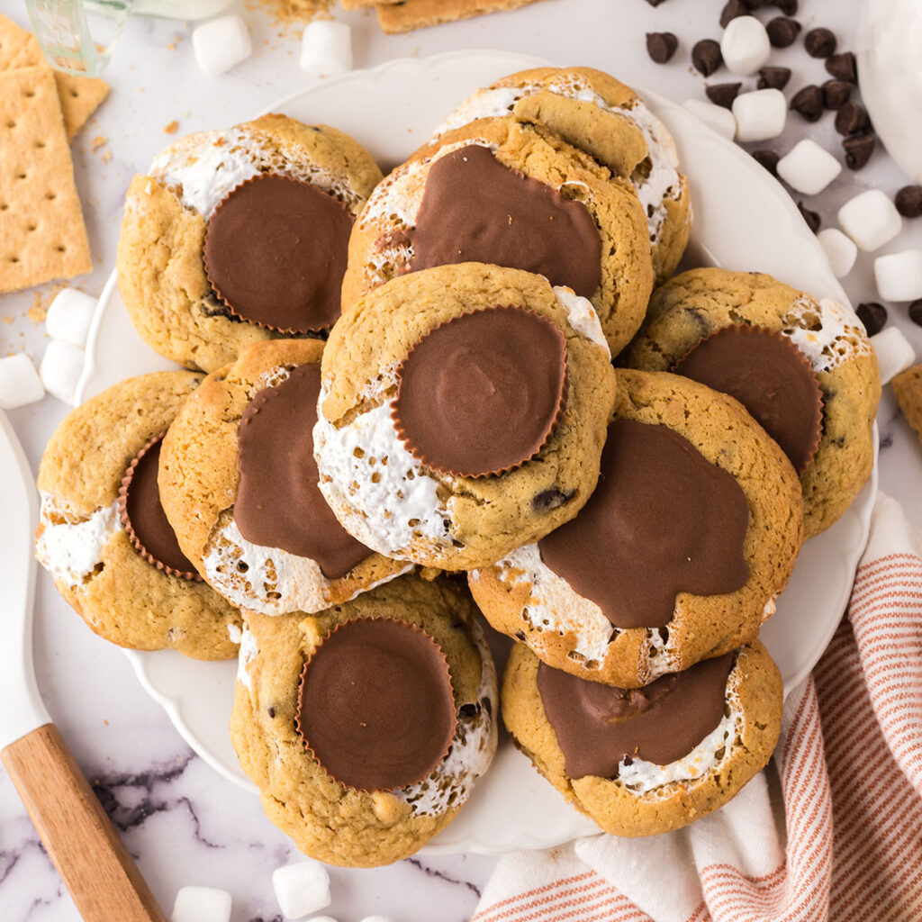 Peanut Butter S&rsquo;mores Cookies on a white plate.