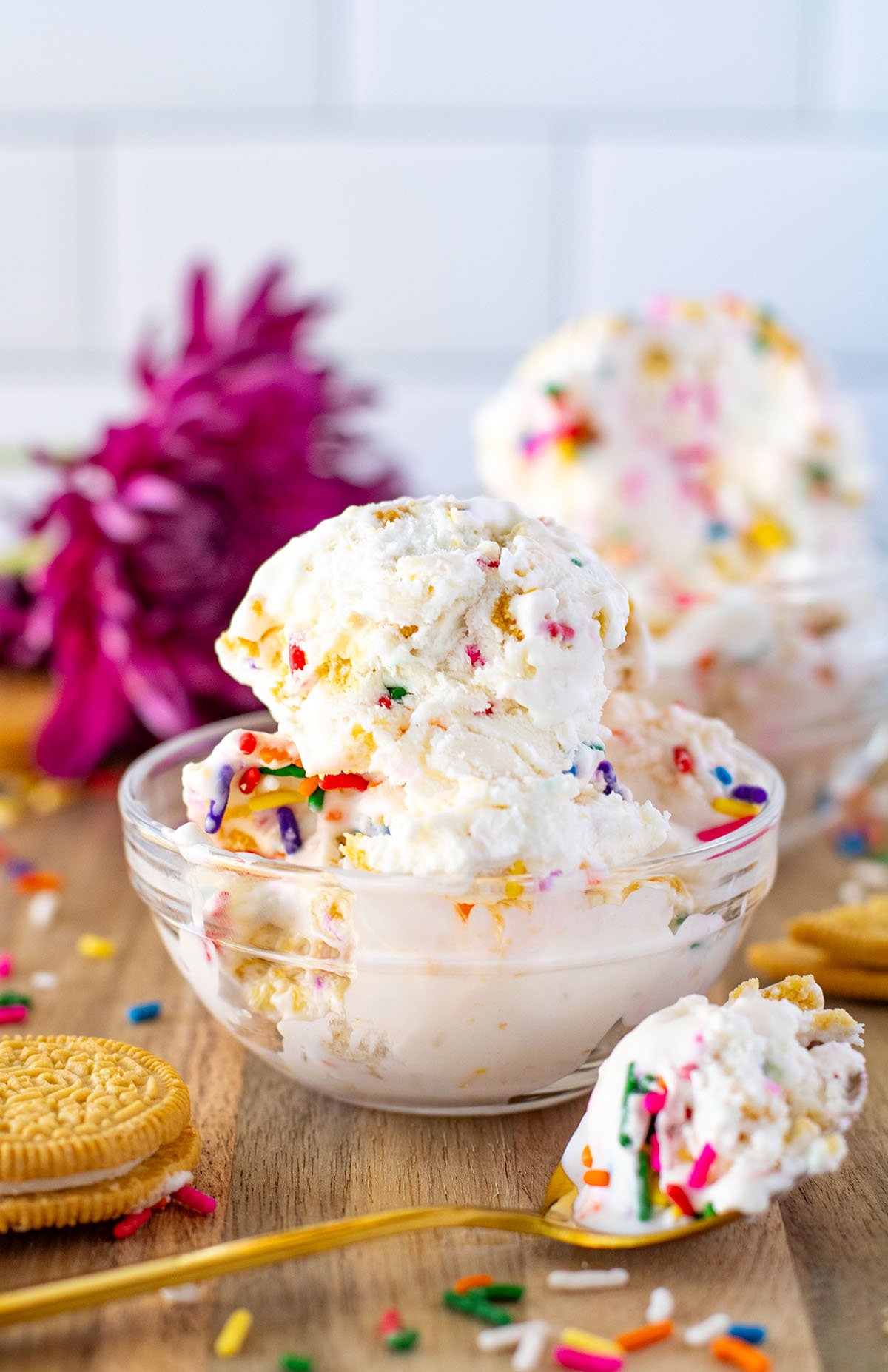 Funfetti Golden Oreo Ice Cream served in a glass dessert bowl.